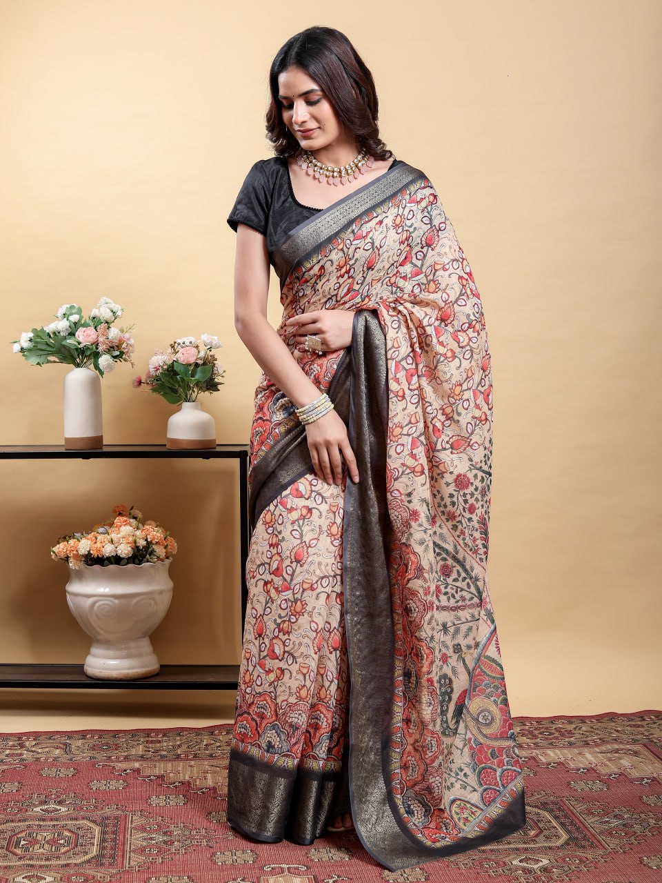 Elegant Beige Kalamkari Saree with Peacock/Bird Motif and Black Zari Border