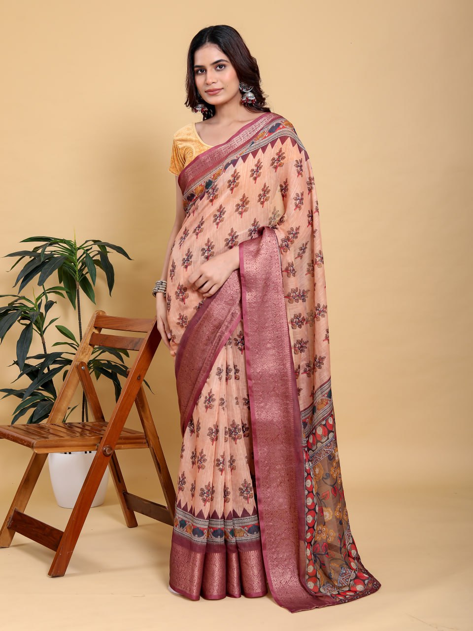 Elegant Peach/Coral Floral Print Saree with Maroon Zari Border