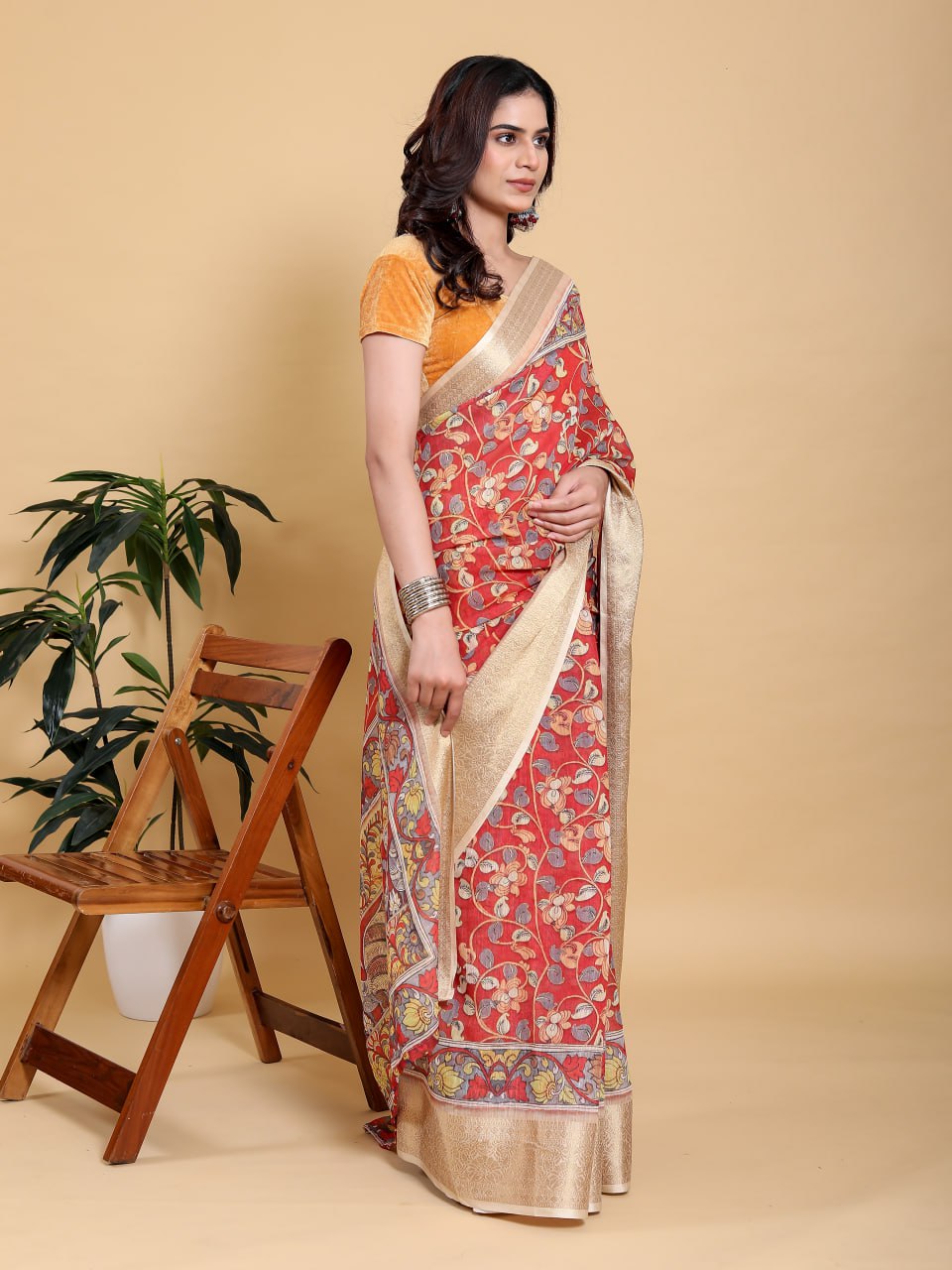 Vibrant Red Kalamkari Print Saree with Broad Zari Border