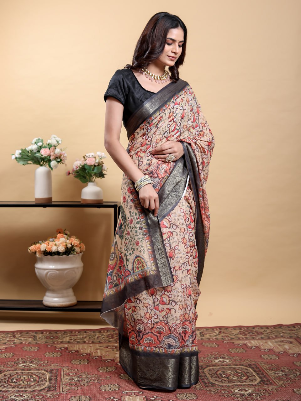Elegant Beige Kalamkari Saree with Peacock/Bird Motif and Black Zari Border