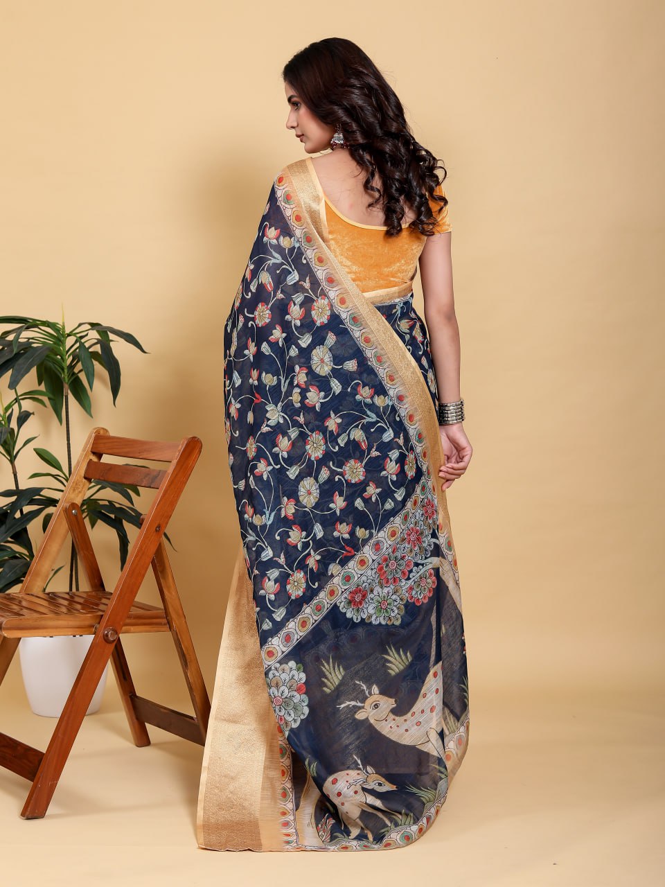Elegant Navy Blue Floral Print Saree with Deer Motif and Zari Border