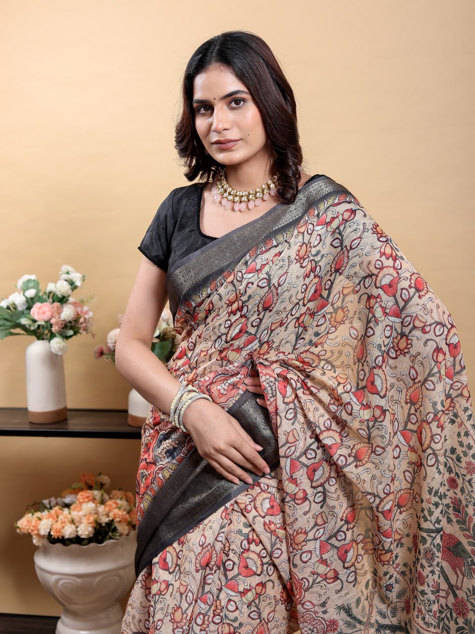 Elegant Beige Kalamkari Saree with Peacock/Bird Motif and Black Zari Border