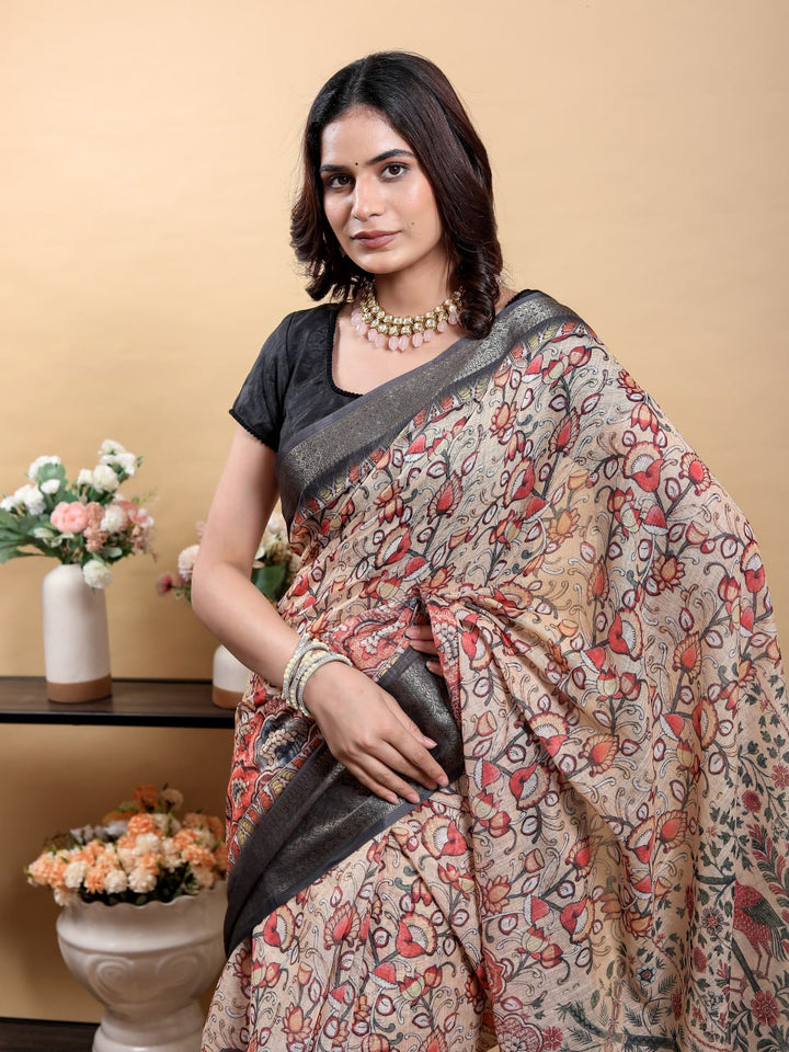 Elegant Beige Kalamkari Saree with Peacock/Bird Motif and Black Zari Border