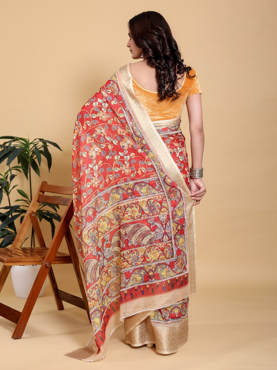 Vibrant Red Kalamkari Print Saree with Broad Zari Border